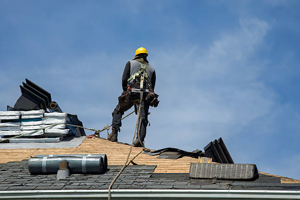 Professional Roofing technician working in Massena, IA